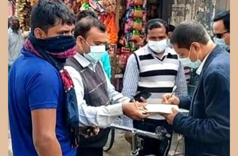 কুড়িগ্রামের ফুলবাড়ীতে মাস্ক না পরায় ২২ জনকে জরিমানা