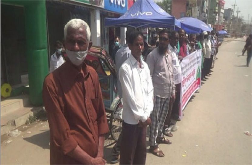 পাটকল ও চিনিকল খুলে দেওয়ার দাবিতে মানববন্ধন