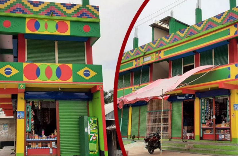 পাবনার ছাইকোলা চৌরাস্তা মোড়ের আসকান আলী সুপার মার্কেট এভাবেই রাঙিয়েছেন ব্রাজিল ভক্ত ব্যবসায়ী শাহীন হোসেন