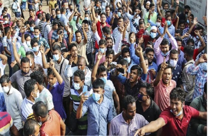 টিকা না পেয়ে প্রবাসীদের বিক্ষোভ