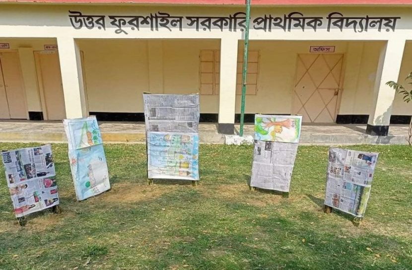 মুন্সীগঞ্জে কাগজে মোড়ানো শহীদ মিনারে শ্রদ্ধা জানায় শিক্ষার্থীরা